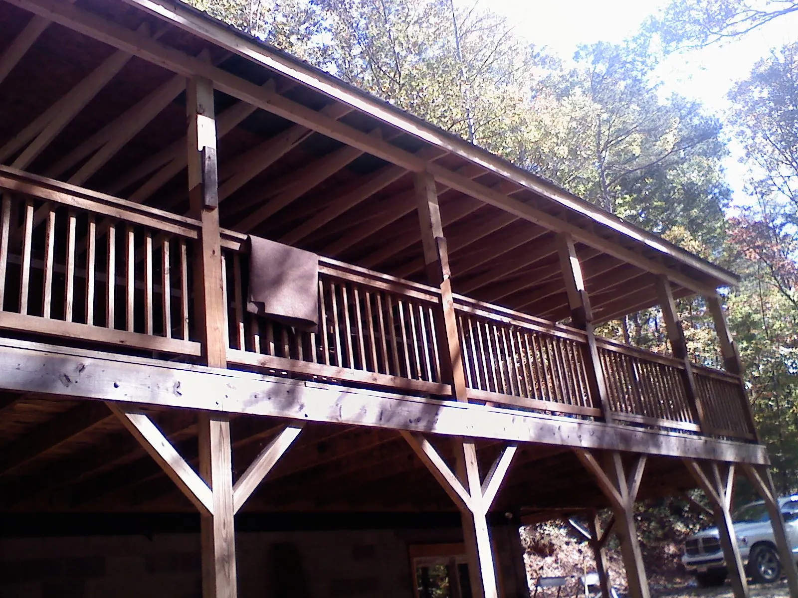 Timber framing under a new elevated porch and deck — Roof Leak Repair in Redwood City by Roofing Brothers